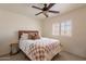 Inviting bedroom with a ceiling fan and lots of natural light at 1125 S Larkspur St, Gilbert, AZ 85296