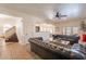 View of the expansive living room highlighting the stairs, tiled floor, and open access to the kitchen at 1125 S Larkspur St, Gilbert, AZ 85296