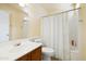 Functional bathroom with a tub, shower, and single sink vanity at 11921 W Flores Dr, El Mirage, AZ 85335