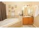 Bathroom showcasing a large soaking tub at 1210 W Betty Elyse Ln, Phoenix, AZ 85023