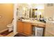 Bathroom featuring storage cabinets and sink at 1210 W Betty Elyse Ln, Phoenix, AZ 85023