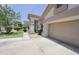 Single-story home with an attached two-car garage and well-maintained yard at 1210 W Betty Elyse Ln, Phoenix, AZ 85023
