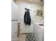 Laundry room with a washer, dryer, and storage cabinets at 1210 W Betty Elyse Ln, Phoenix, AZ 85023