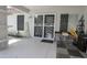 Covered patio area featuring a security door with a decorative sunburst design at 1210 W Betty Elyse Ln, Phoenix, AZ 85023