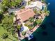 Waterfront living offering a boat dock, outdoor kitchen, and mature landscaping at 1241 W Lobster Trap Dr, Gilbert, AZ 85233