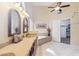 Spacious bathroom with dual sinks, soaking tub and separate closet at 1241 W Lobster Trap Dr, Gilbert, AZ 85233