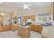 Bright kitchen featuring wood cabinets, center island, tile floor and stainless steel appliances at 1241 W Lobster Trap Dr, Gilbert, AZ 85233