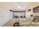 Spacious main bedroom featuring lake views, sitting area and ensuite at 1241 W Lobster Trap Dr, Gilbert, AZ 85233