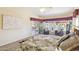 Spacious main bedroom featuring lake views and a comfortable sitting area at 1241 W Lobster Trap Dr, Gilbert, AZ 85233