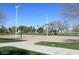 Sandy volleyball court surrounded by lush greenery in a Gathering-friendly neighborhood at 1241 W Lobster Trap Dr, Gilbert, AZ 85233