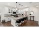 Modern kitchen featuring white cabinets, a marble island, and stainless steel appliances at 1250 N Abbey Ln # 206, Chandler, AZ 85226