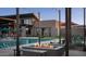 Enjoy the community pool and outdoor fireplace and lounge area at 1250 N Abbey Ln # 206, Chandler, AZ 85226
