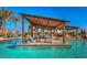 Relax at the pool on the lounge area with seating at 1250 N Abbey Ln # 206, Chandler, AZ 85226