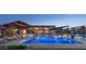 View of the community pool, outdoor seating, and lounging areas at 1250 N Abbey Ln # 206, Chandler, AZ 85226