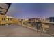 This stunning rooftop deck offers amazing views of the neighborhood with a relaxing space to unwind at 1250 N Abbey Ln # 206, Chandler, AZ 85226