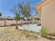 Backyard featuring a covered patio, gravel landscaping, and a sturdy block fence at 13431 N 30Th St, Phoenix, AZ 85032