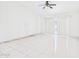 Bright, spacious bedroom with tile floors and large sliding glass doors at 13431 N 30Th St, Phoenix, AZ 85032