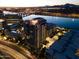 Night aerial view of a river, buildings, and mountains in the distance at 140 E Rio Salado Pkwy # 1006, Tempe, AZ 85281