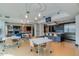 Expansive common area featuring a kitchen, a living room area, and dining tables at 140 E Rio Salado Pkwy # 1006, Tempe, AZ 85281