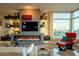 Modern living room with sleek shelving and stylish fireplace, showcasing beautiful views at 140 E Rio Salado Pkwy # 1006, Tempe, AZ 85281