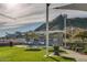 Outdoor kitchen and grilling area with green lawn space and stadium view at 140 E Rio Salado Pkwy # 1006, Tempe, AZ 85281