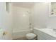 Clean, bright bathroom featuring a shower-tub combo and a modern vanity at 1408 E Orange St, Tempe, AZ 85281