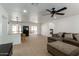 Open-concept living space showcasing modern finishes, tile floors, and access to the outdoor patio at 1408 E Orange St, Tempe, AZ 85281