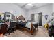 Fun bedroom with wooden bed frame, a desk and lots of natural light at 1442 W Laurel Ave, Gilbert, AZ 85233