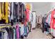 Spacious walk-in closet provides plenty of storage, perfect for organizing clothes, shoes, and accessories at 1442 W Laurel Ave, Gilbert, AZ 85233