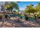 Lush green space with water features and picnic tables, perfect for outdoor gatherings and relaxation at 1442 W Laurel Ave, Gilbert, AZ 85233