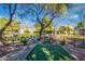 Scenic park area with lush greenery, mature trees, and water features, offering a tranquil retreat at 1442 W Laurel Ave, Gilbert, AZ 85233