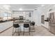 Spacious kitchen with large island, modern appliances, and eat-in breakfast bar at 1442 W Laurel Ave, Gilbert, AZ 85233
