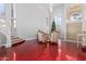 Bright, open living room boasts high ceilings and abundant natural light from large windows at 1442 W Laurel Ave, Gilbert, AZ 85233