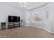 Bright living area with updated flooring and a bay window that provides lots of light at 1442 W Laurel Ave, Gilbert, AZ 85233