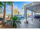 Backyard paradise boasts a refreshing pool, lush landscaping and a covered patio area at 1442 W Laurel Ave, Gilbert, AZ 85233