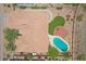 Aerial shot showcases the home, swimming pool, and desert landscaping at 16219 S 14Th Way, Phoenix, AZ 85048