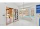 Bright breakfast nook with views of the pool and backyard from the large windows at 16219 S 14Th Way, Phoenix, AZ 85048