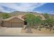Beautiful one-story home with lush trees, desert landscaping and a three car garage at 16219 S 14Th Way, Phoenix, AZ 85048
