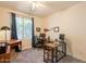 Bedroom with multiple computer tables, ceiling fan and good natural light, ideal for a home office at 1635 E Harrison St, Chandler, AZ 85225