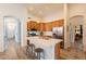Bright, open kitchen with a large island, stainless steel appliances, and wooden cabinetry at 1635 E Harrison St, Chandler, AZ 85225