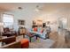 Inviting living room boasts a neutral color palette, ceiling fan, and abundant natural light at 1635 E Harrison St, Chandler, AZ 85225
