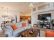 Open-concept living room with seamless flow to the kitchen and dining area, perfect for entertaining at 1635 E Harrison St, Chandler, AZ 85225