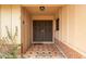 An enclosed front porch with a decorative double door and tile flooring at 1874 E Huntington Dr, Tempe, AZ 85282