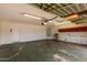 Spacious garage featuring storage, laundry tub, and lighting at 1874 E Huntington Dr, Tempe, AZ 85282
