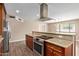 Chef's kitchen featuring stainless steel appliances and granite countertops at 1874 E Huntington Dr, Tempe, AZ 85282