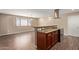 Eat-in kitchen features a breakfast bar, modern appliances, and pendant lighting at 1874 E Huntington Dr, Tempe, AZ 85282
