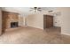 Spacious living room with brick fireplace and tile flooring offers a cozy atmosphere at 1874 E Huntington Dr, Tempe, AZ 85282