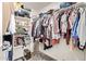 Walk-in closet providing ample storage with shelving and hanging space at 19951 W Wilson St, Buckeye, AZ 85326
