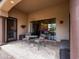 Cozy backyard with comfortable seating, desert landscaping, and privacy at 20439 E Palomino Dr, Queen Creek, AZ 85142