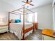 Bright bedroom with wood floors, full-sized bed and plenty of light at 20439 E Palomino Dr, Queen Creek, AZ 85142